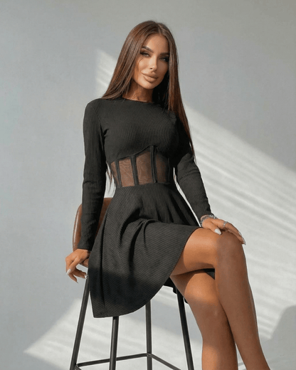 Monaco Mini Dress by Lauven, a black long sleeve A-line mini dress featuring a sheer corset panel and stylish silhouette.