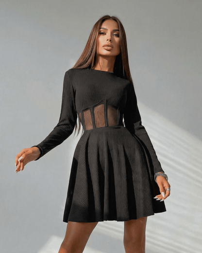 Lauven Monaco Mini Dress in black, featuring long sleeves and sheer corset panel, showcasing a stylish A-line silhouette.