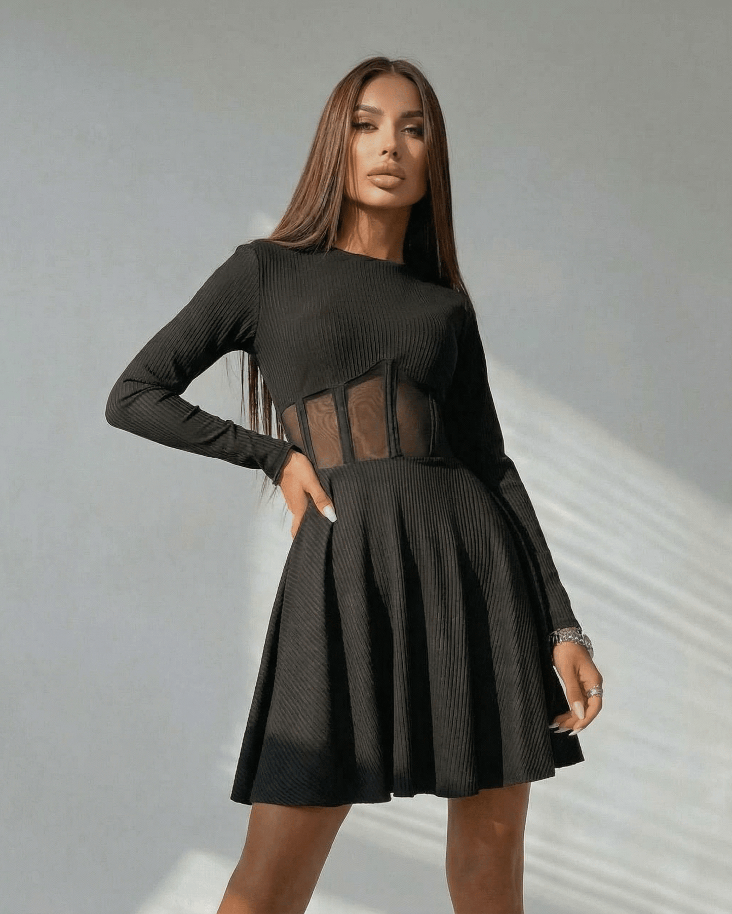 Monaco Mini Dress by Lauven – Black long sleeve A-line dress with sheer corset detail, perfect for elegant occasions.