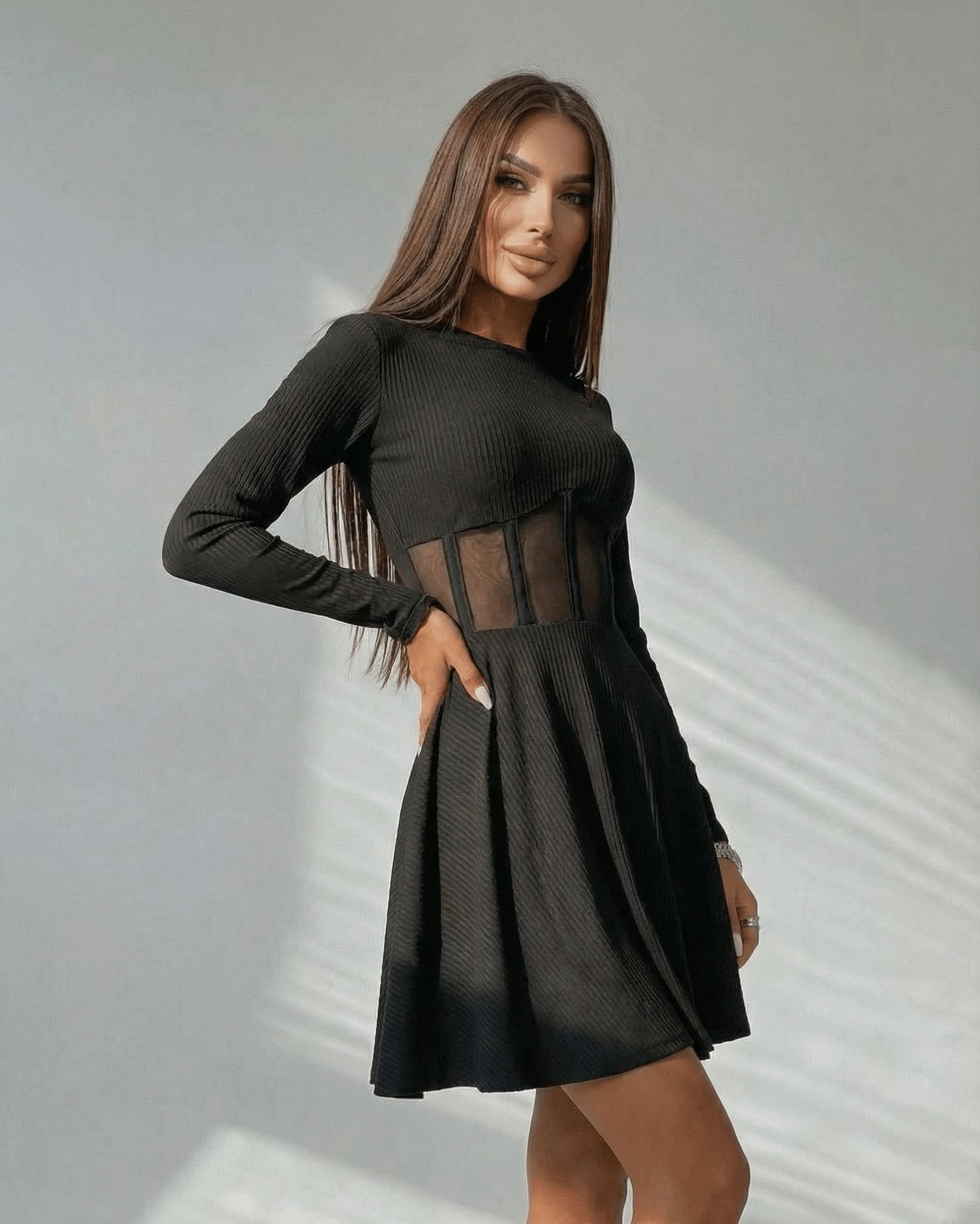 Monaco Mini Dress by Lauven - Black long sleeve A-line dress with sheer corset panel and O-neckline, perfect for stylish occasions.