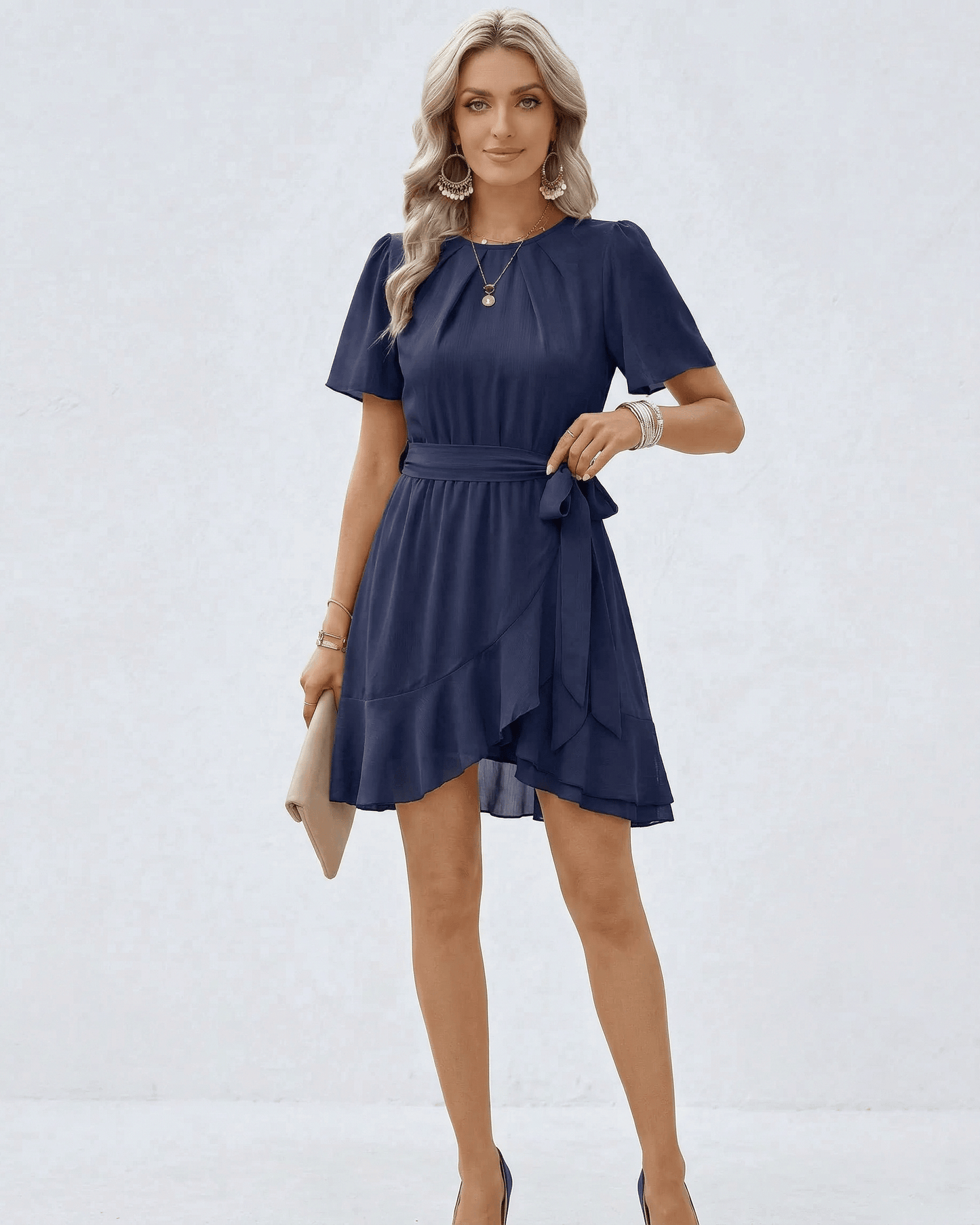 Navy Ruffle Dress by Lauven featuring flutter sleeves and a waist tie, perfect for a sophisticated look.