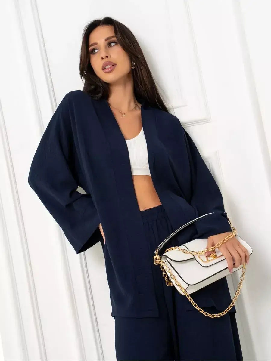 Navy Suit Set by Lauven showcasing a model in a chic oversized deep blue two-piece outfit.