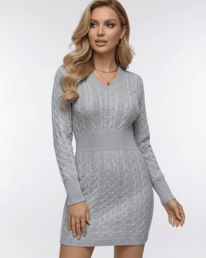 Nimbus Mini Dress by Lauven – Light gray cable knit V-neck dress with elastic waist and long sleeves.