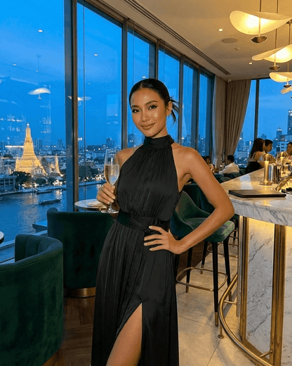 Noctis Maxi Dress by Lauven, an elegant sleeveless turtleneck dress featuring a high waist and side slit, perfect for evening wear.