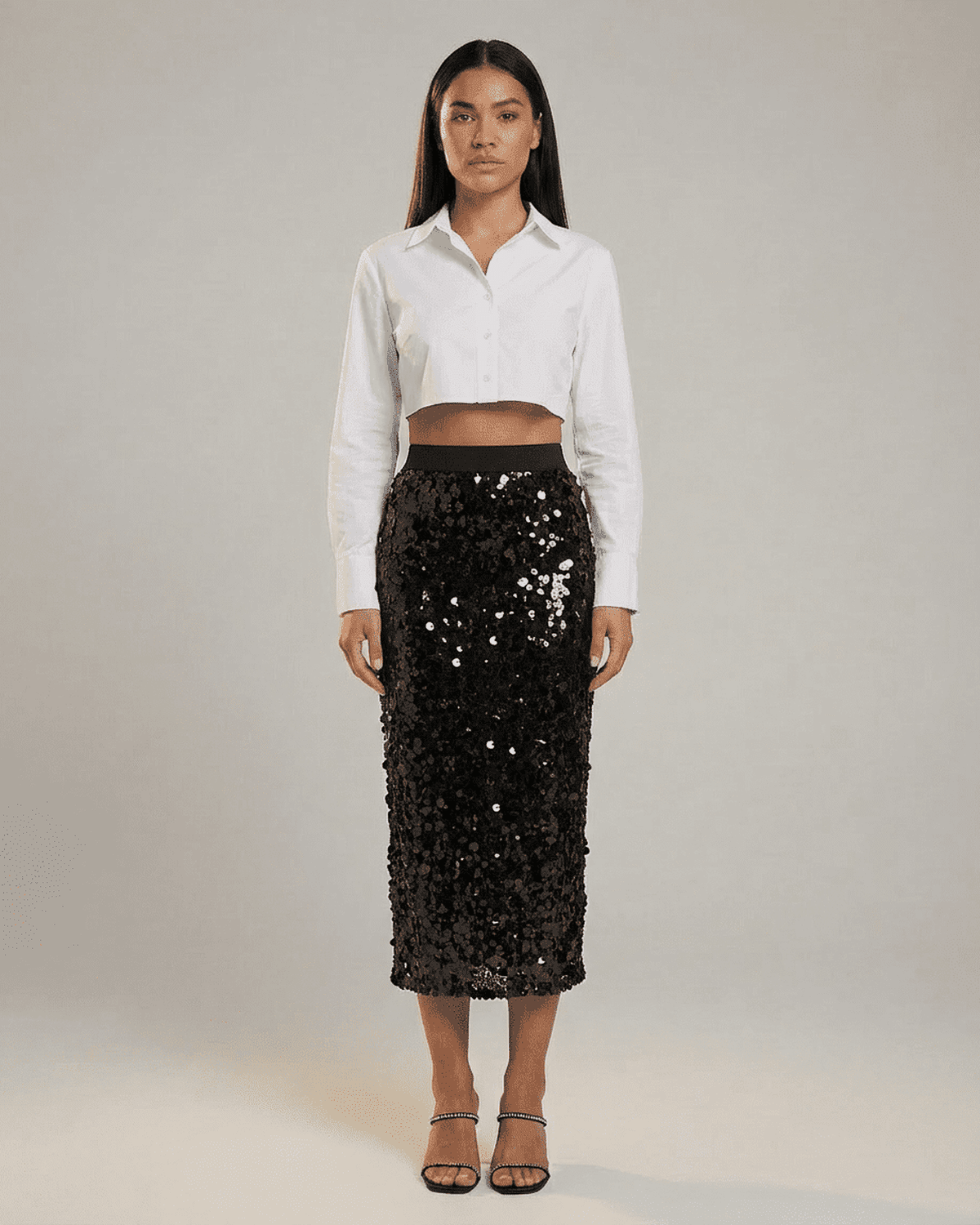 Noctura Midi Skirt by Lauven – Sequin high waist bodycon midi skirt styled for an elegant evening look.