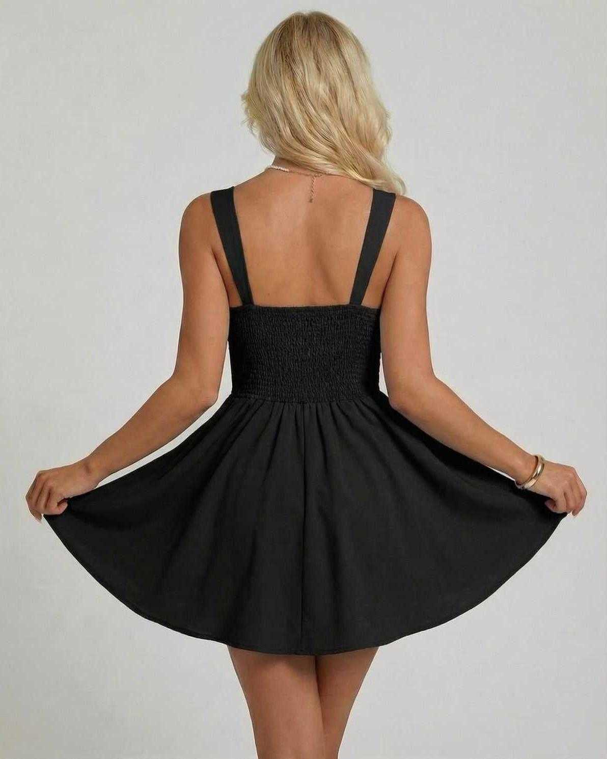 Noctura Mini Dress by Lauven, featuring a sleeveless V-neck cami silhouette in black, showcasing a flowing skirt.