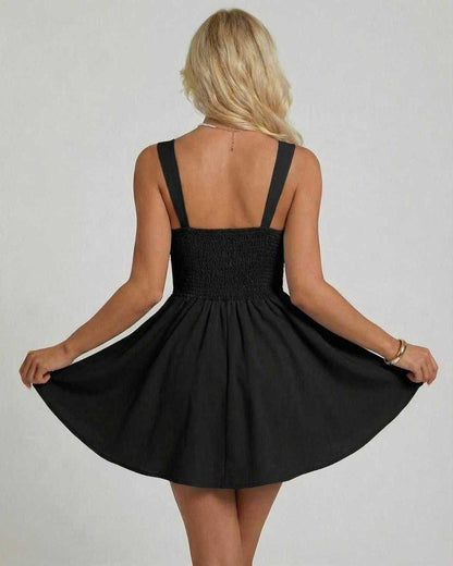 Noctura Mini Dress by Lauven, featuring a sleeveless V-neck cami silhouette in black, showcasing a flowing skirt.