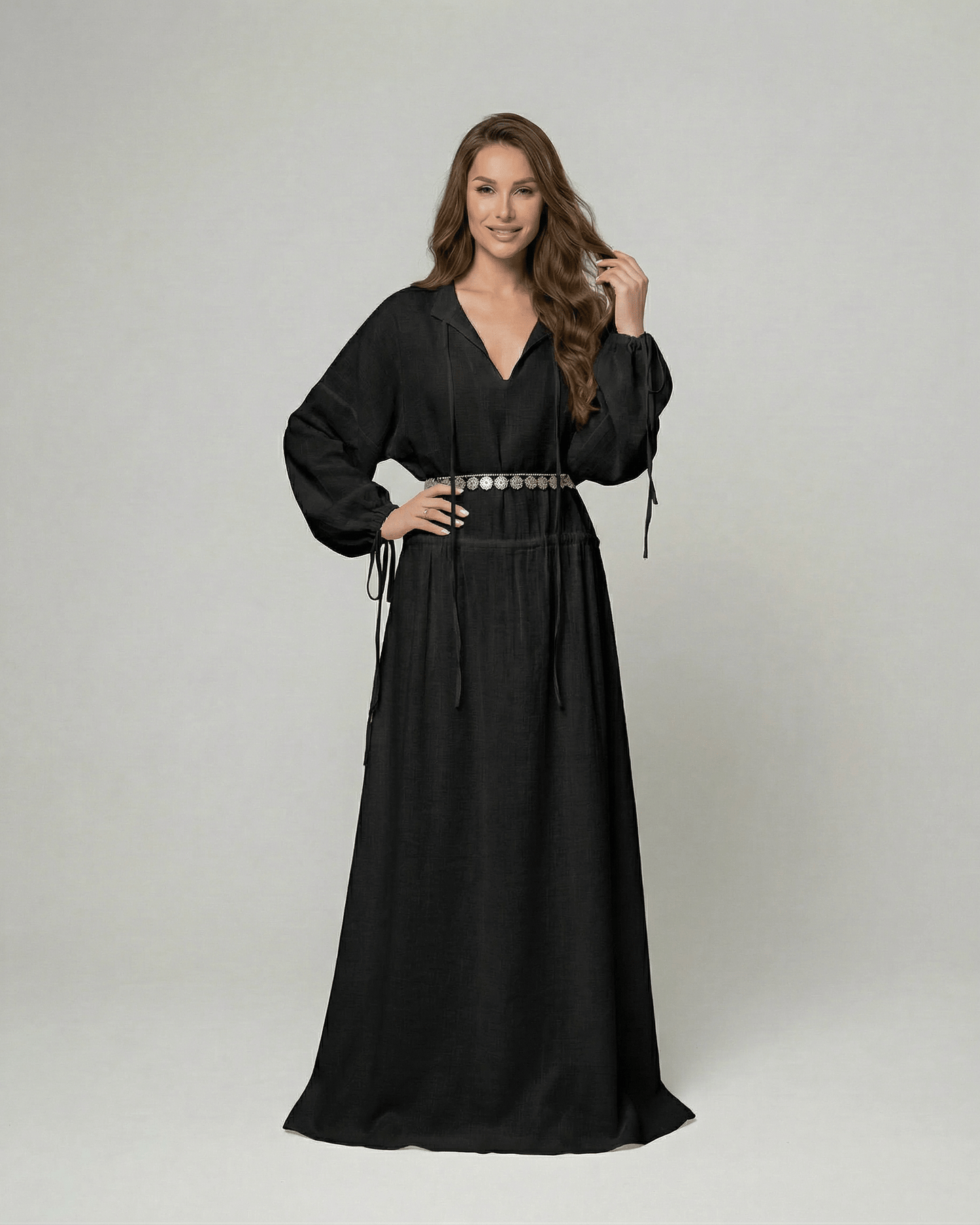 Nocturne Maxi Dress by Lauven, black cotton A-line maxi dress with adjustable waist and long sleeves.
