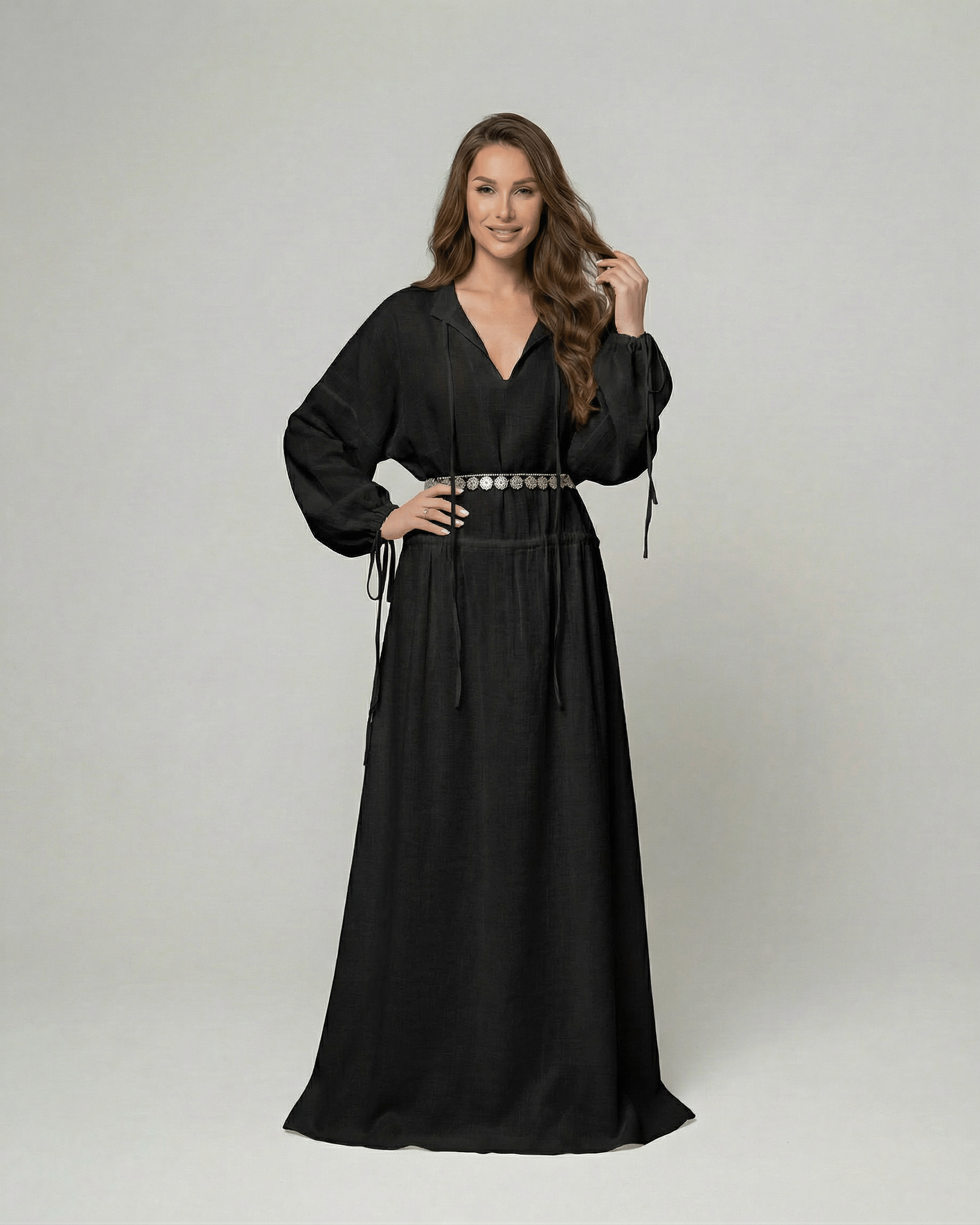 Nocturne Maxi Dress by Lauven, black cotton A-line maxi dress with adjustable waist and long sleeves.