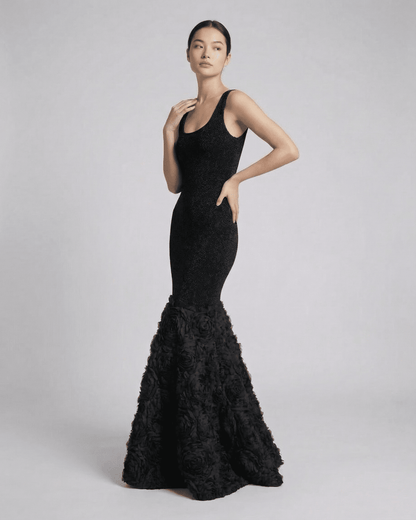 Nocturne Maxi Dress by Lauven — Elegant black maxi dress with sculpted silhouette and textured hem detail.
