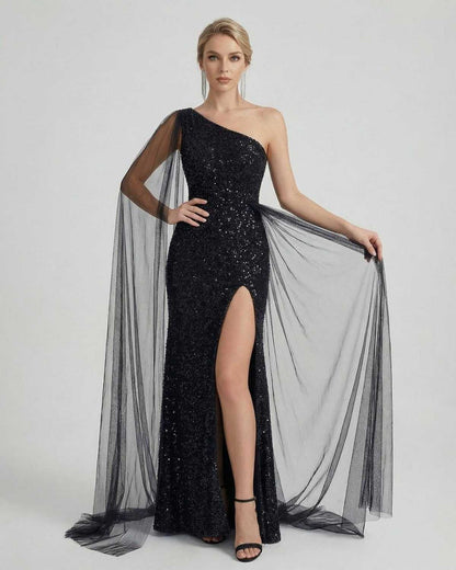 Nocturne Maxi Dress by Lauven - One shoulder sequin gown with sheer mesh drape and side slit detail.