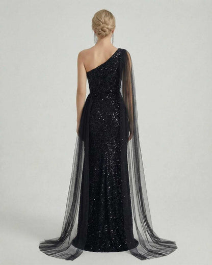 Nocturne Maxi Dress by Lauven - Elegant one shoulder sequin dress with sheer mesh drape, showcasing back view.