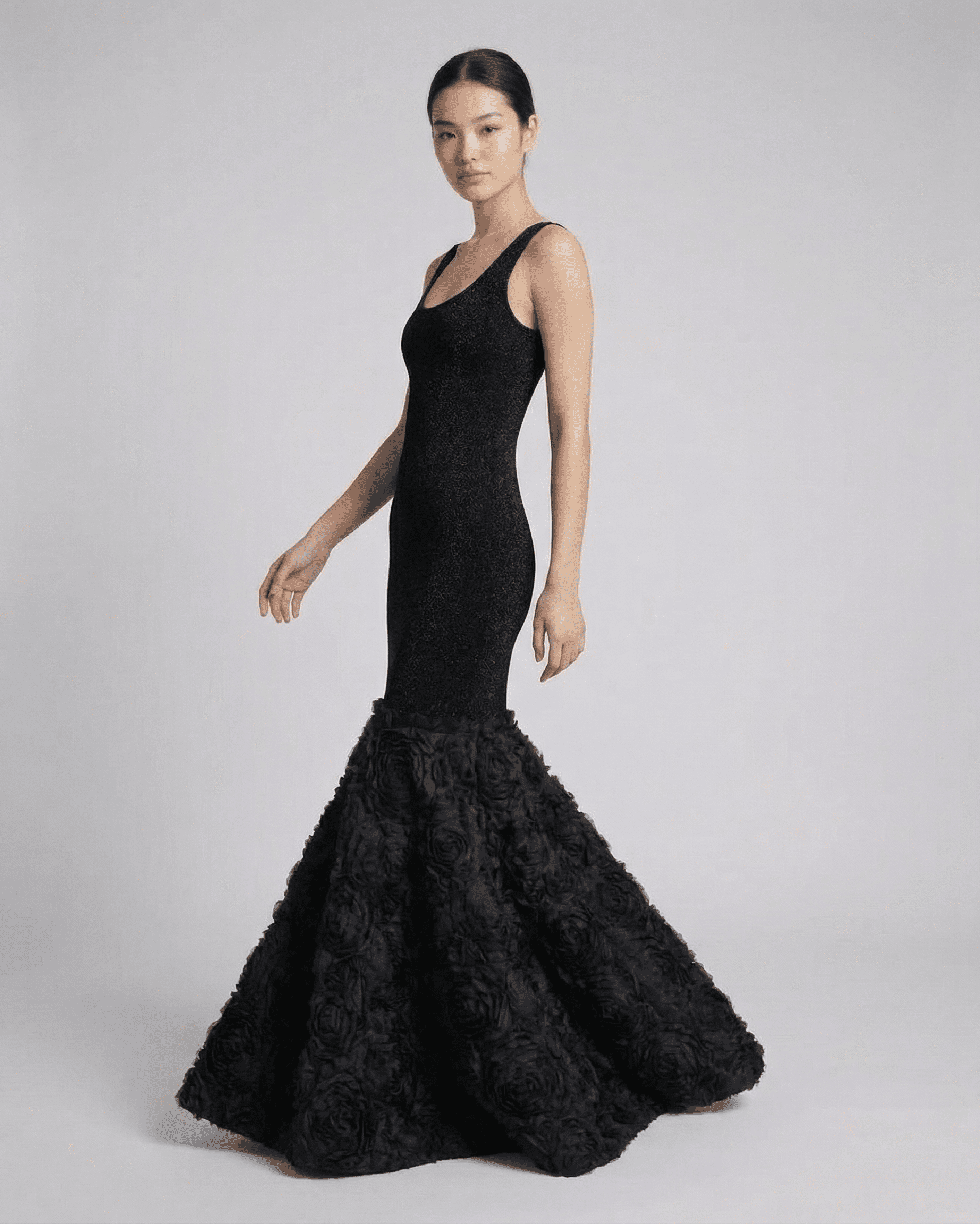 Lauven Nocturne Maxi Dress, elegant black maxi dress with a sculpted silhouette and textured hem detail.