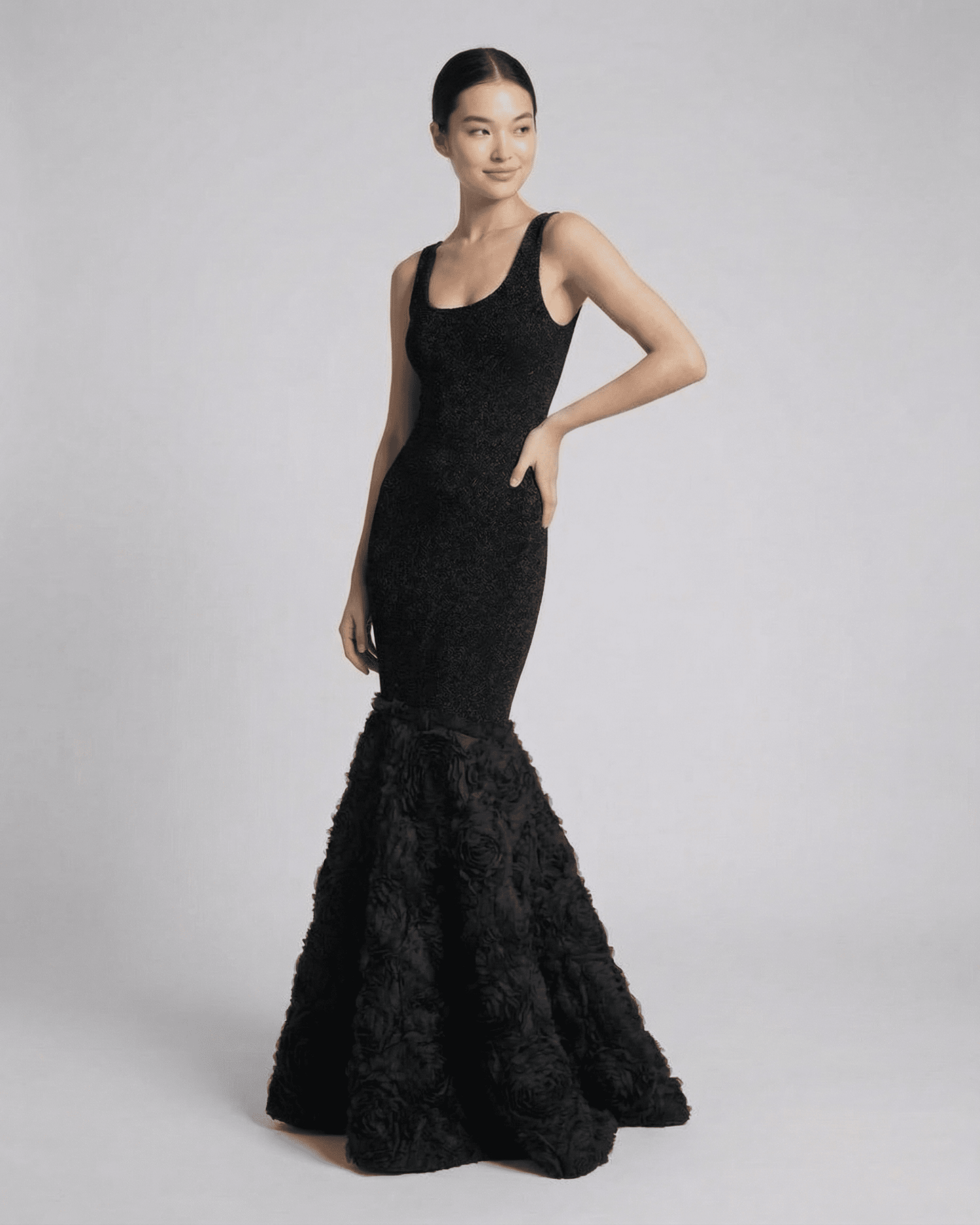 Nocturne Maxi Dress by Lauven, featuring a sculpted silhouette and textured hem detail in elegant black.
