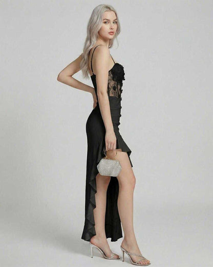 Model wearing the Noir Maxi Dress by Lauven, showcasing lace corset bodice and asymmetrical high-low hem.