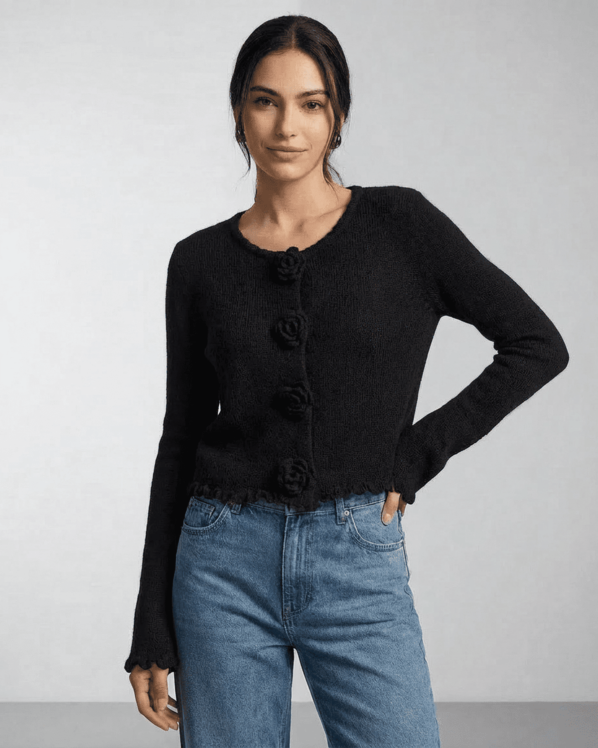 Noir Cardigan by Lauven featuring floral button detailing and a modern silhouette for women's fashion.