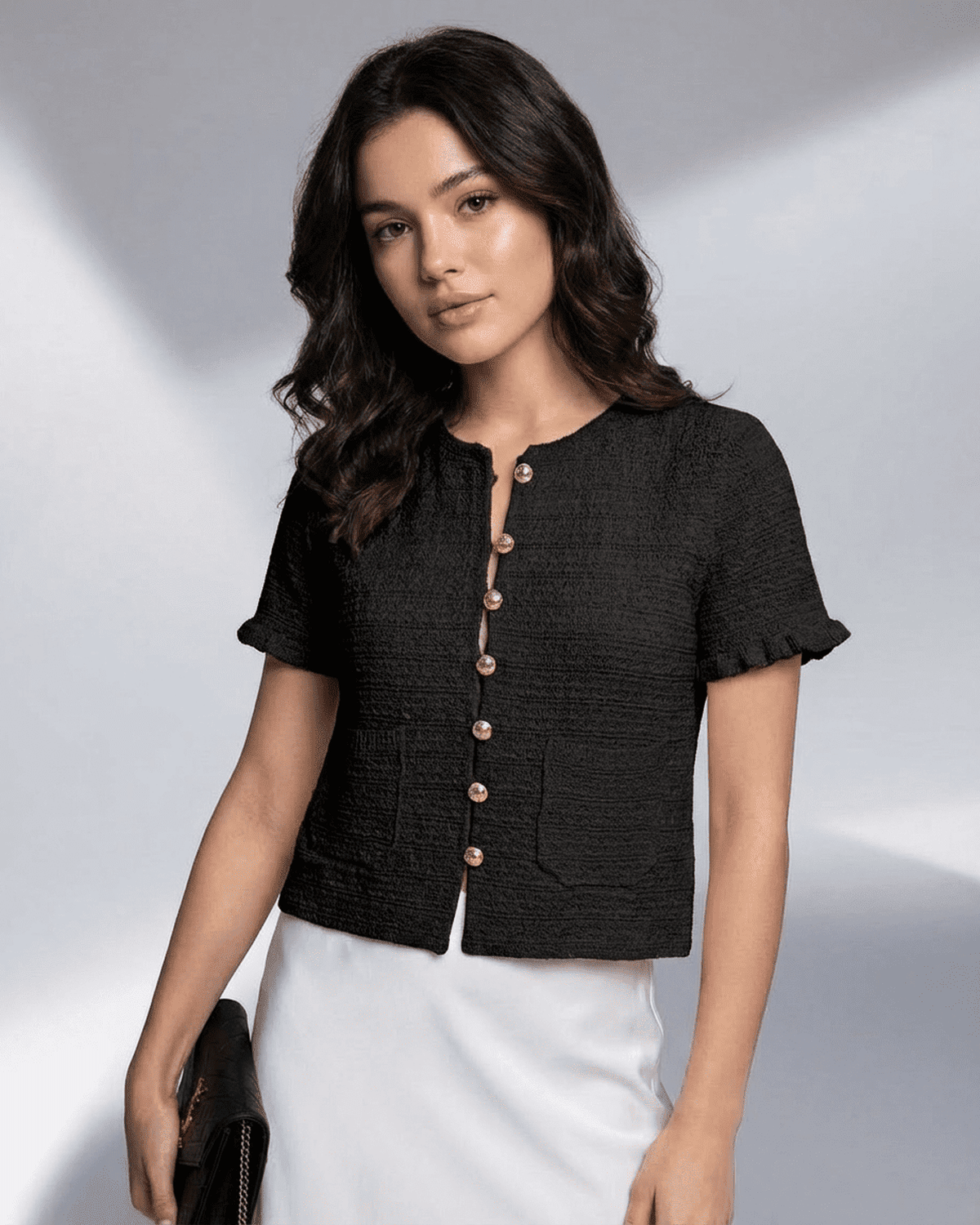 Noir Cardigan by Lauven features short sleeves, button closure, and a refined silhouette in textured polyester.