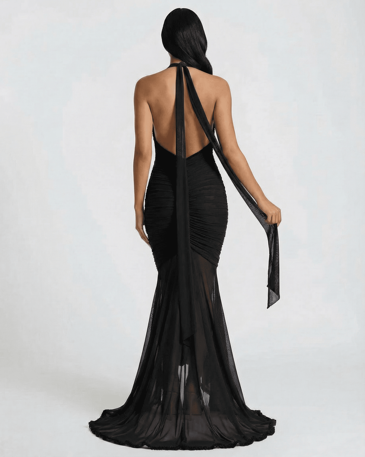 Noir Maxi Dress by Lauven, showcasing the elegant back design and ruched detail in classic black.