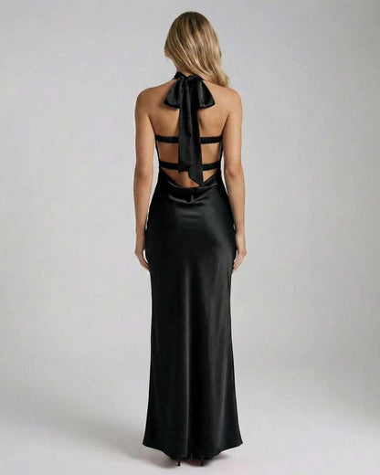 Noir Maxi Dress by Lauven, showcasing the elegant back design with a satin finish and stylish bow detail.