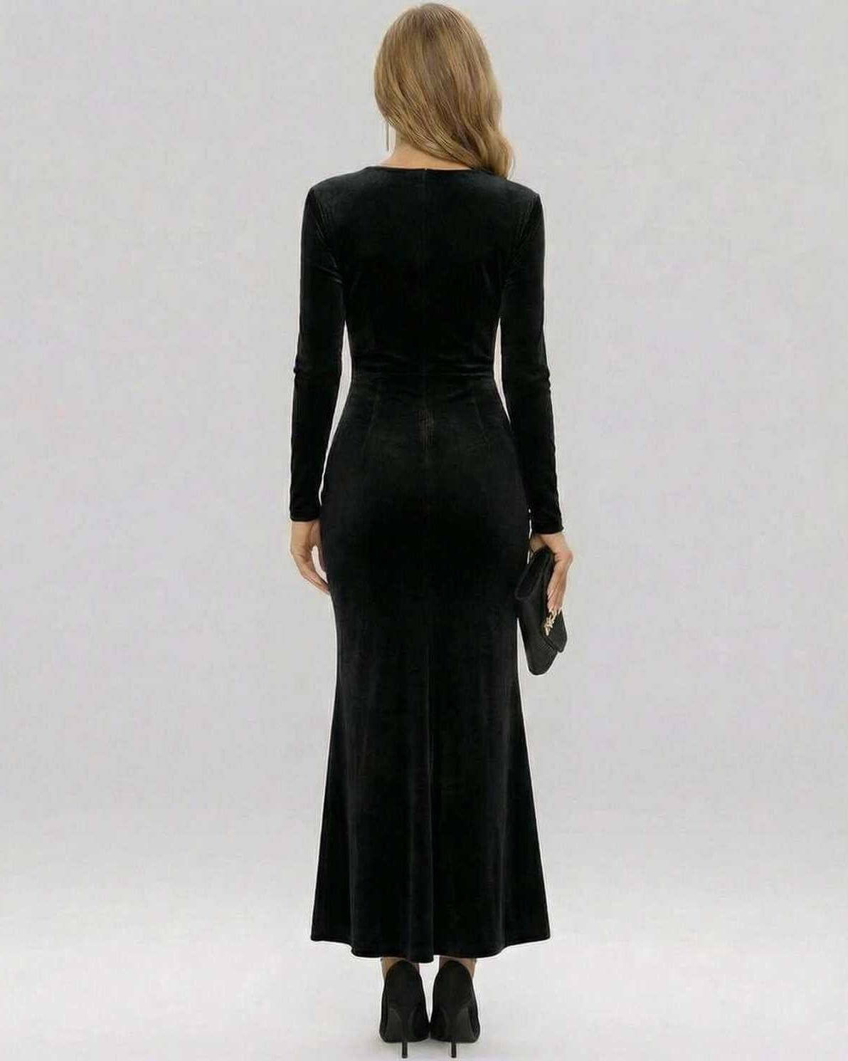 Noir Maxi Dress by Lauven, featuring a luxurious black velvet finish and elegant full-length sleeves.