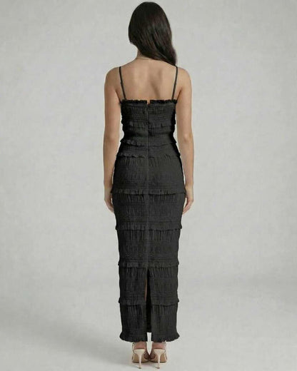 Noir Maxi Dress by Lauven, showcasing the back view with textured pleats and a sleek black design.