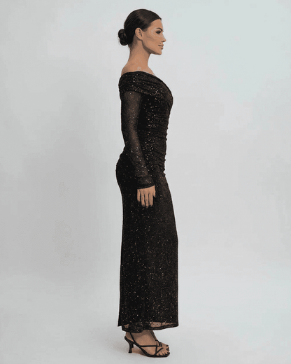 Noir Maxi Dress by Lauven - Elegant off-the-shoulder mesh gown with sequins, showcasing a side profile.