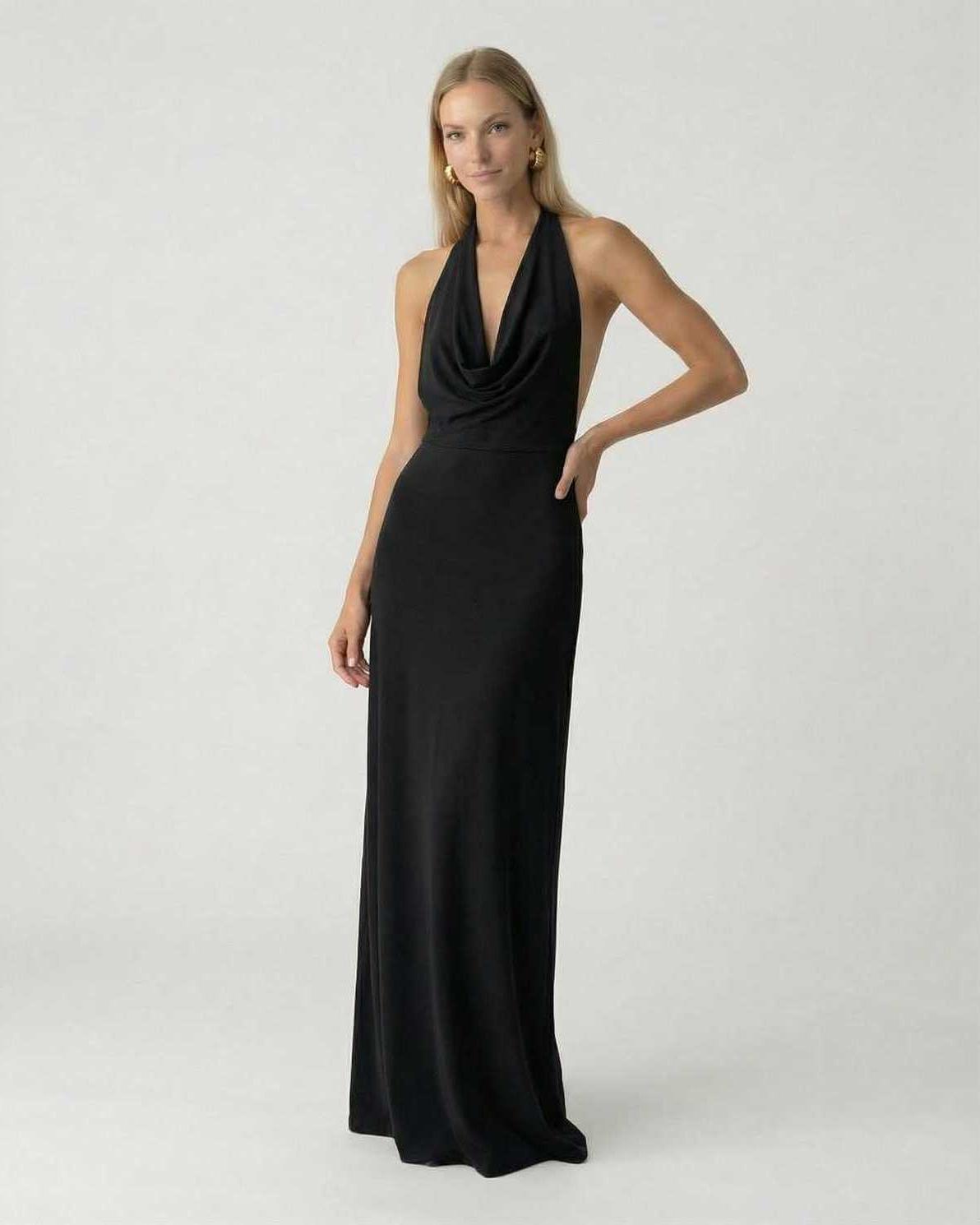 Model wearing Lauven Noir Maxi Dress, a sleek halter neck black slip maxi dress with an elegant silhouette.