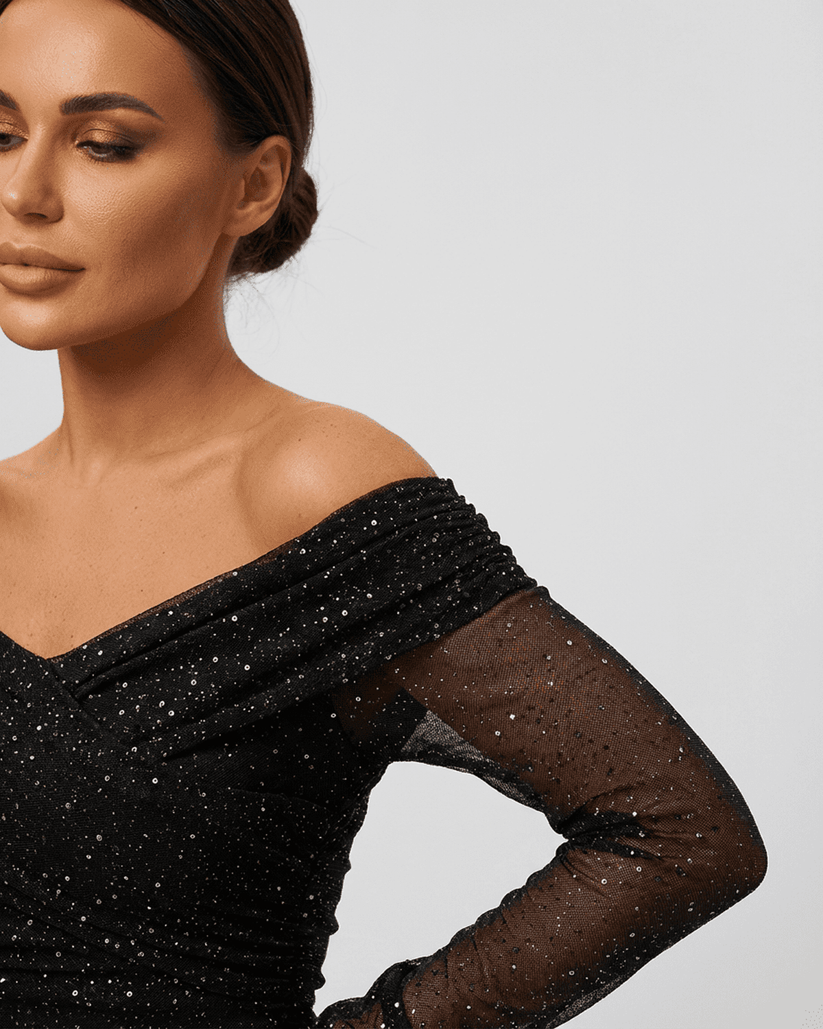 Noir Maxi Dress by Lauven features an elegant off-the-shoulder design with sheer mesh sleeves adorned with sequins.