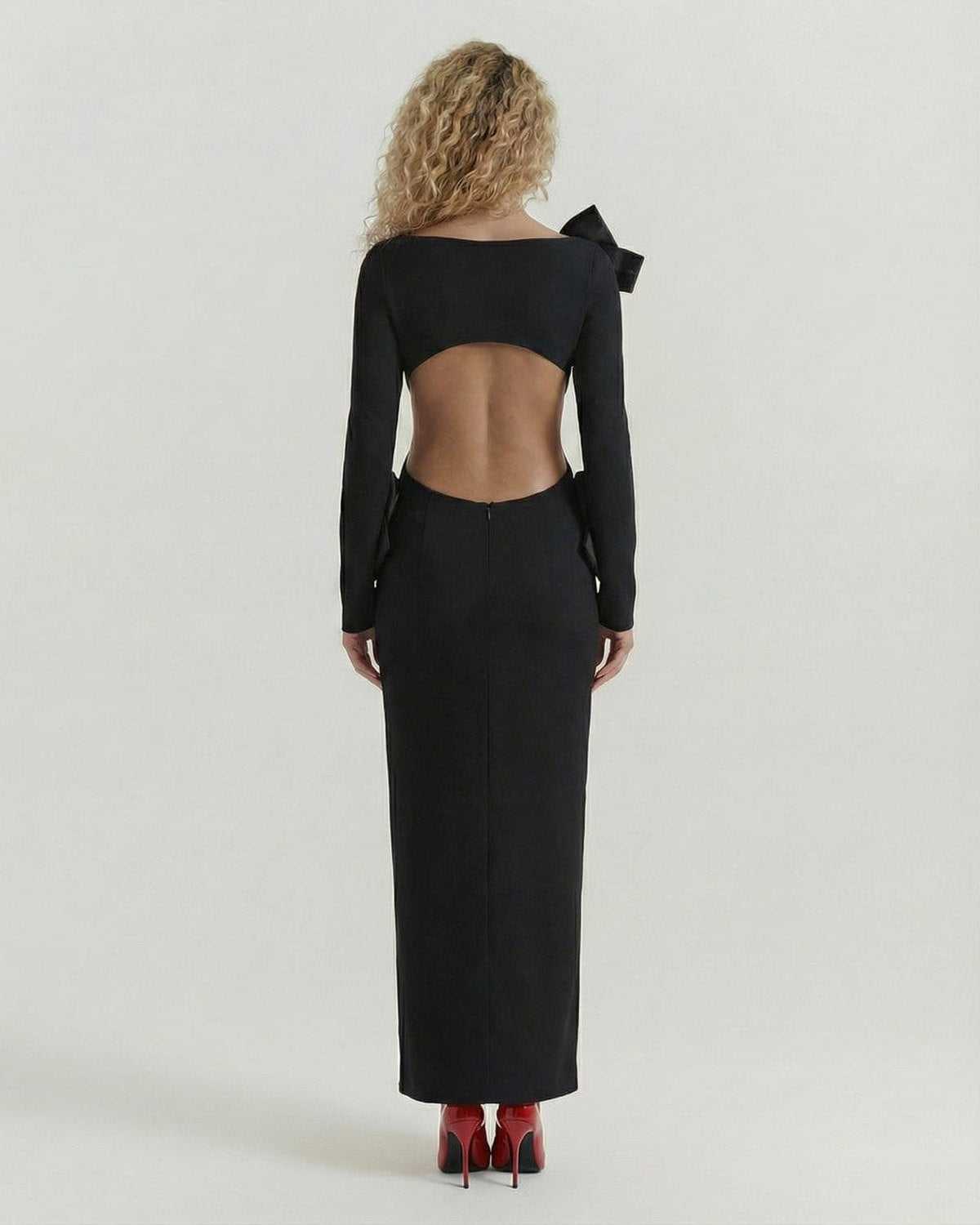 Noir Maxi Dress by Lauven – Back view showcasing open back and bow details in a sleek black design.