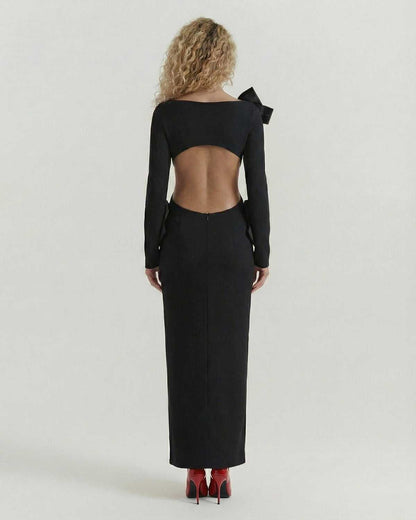 Noir Maxi Dress by Lauven – Back view showcasing open back and bow details in a sleek black design.