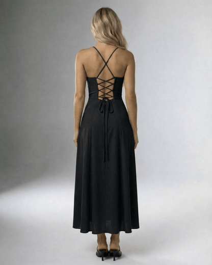 Noir Midi Dress by Lauven featuring a lace-up back and high slit, perfect for elegant evenings.