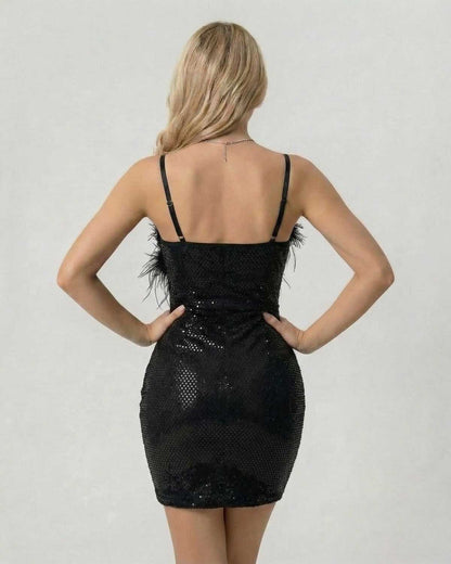 Back view of Noir Mini Dress by Lauven, featuring sequins and faux fur for a chic evening look.