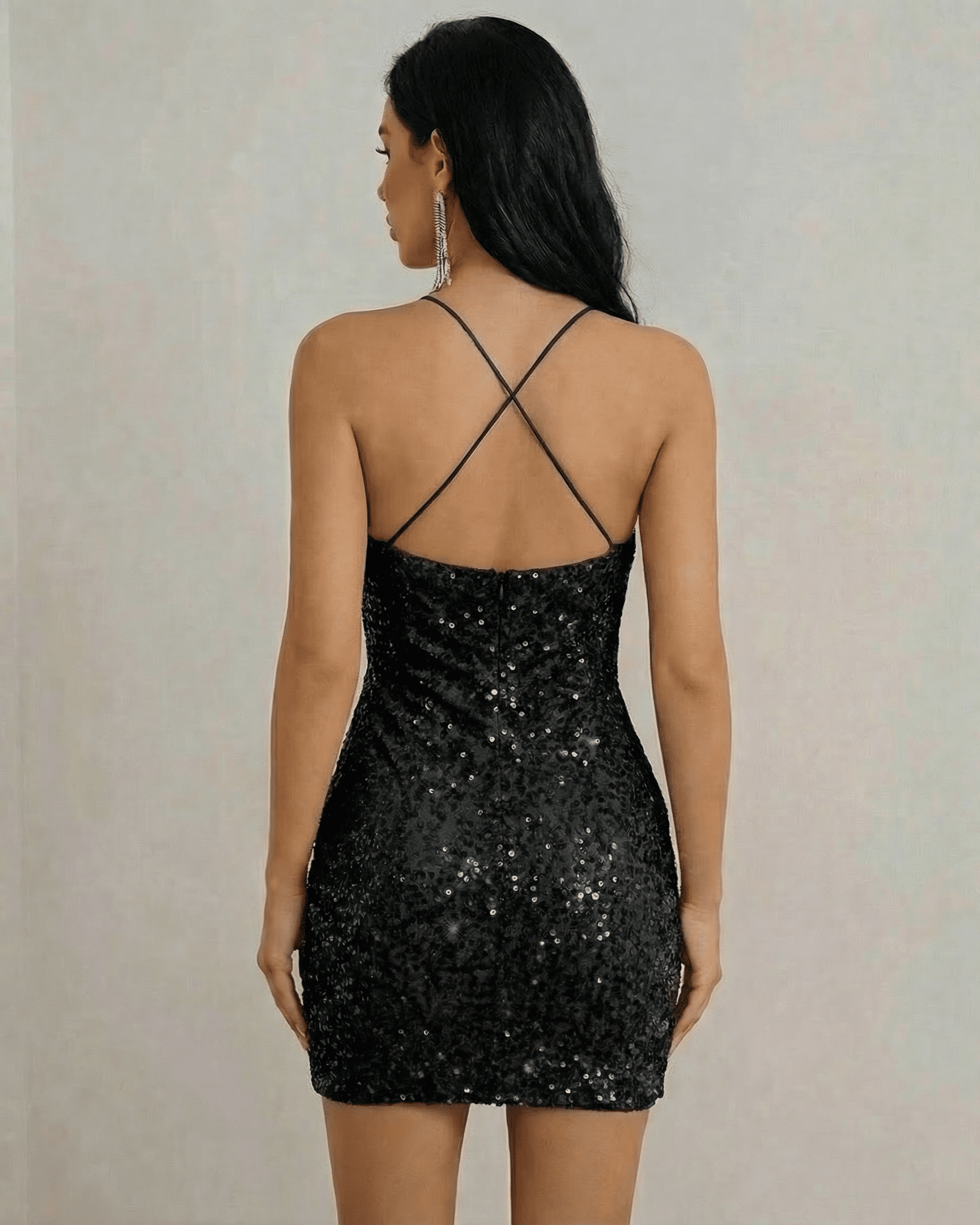 Noir Mini Dress by Lauven, showcasing the back view of a shimmering black sequin halter neck mini dress.