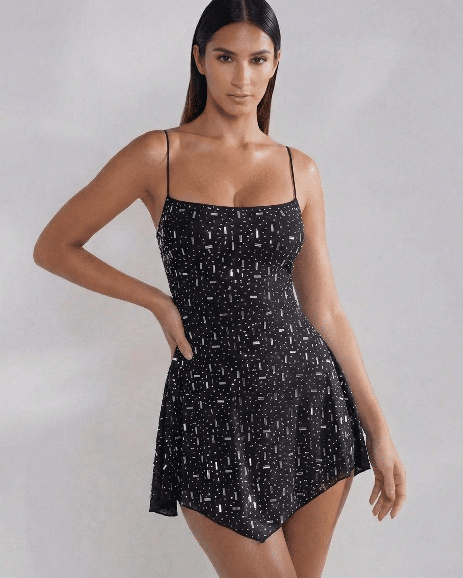 Noir Mini Dress by Lauven, an embellished black mermaid mini dress with square neckline and spaghetti straps.