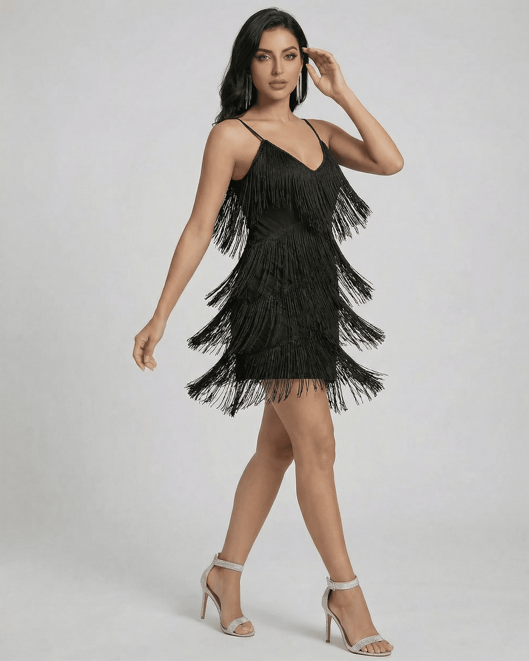 Noir Mini Dress by Lauven featuring fringe V-neck and sleeveless design for a modern aesthetic.