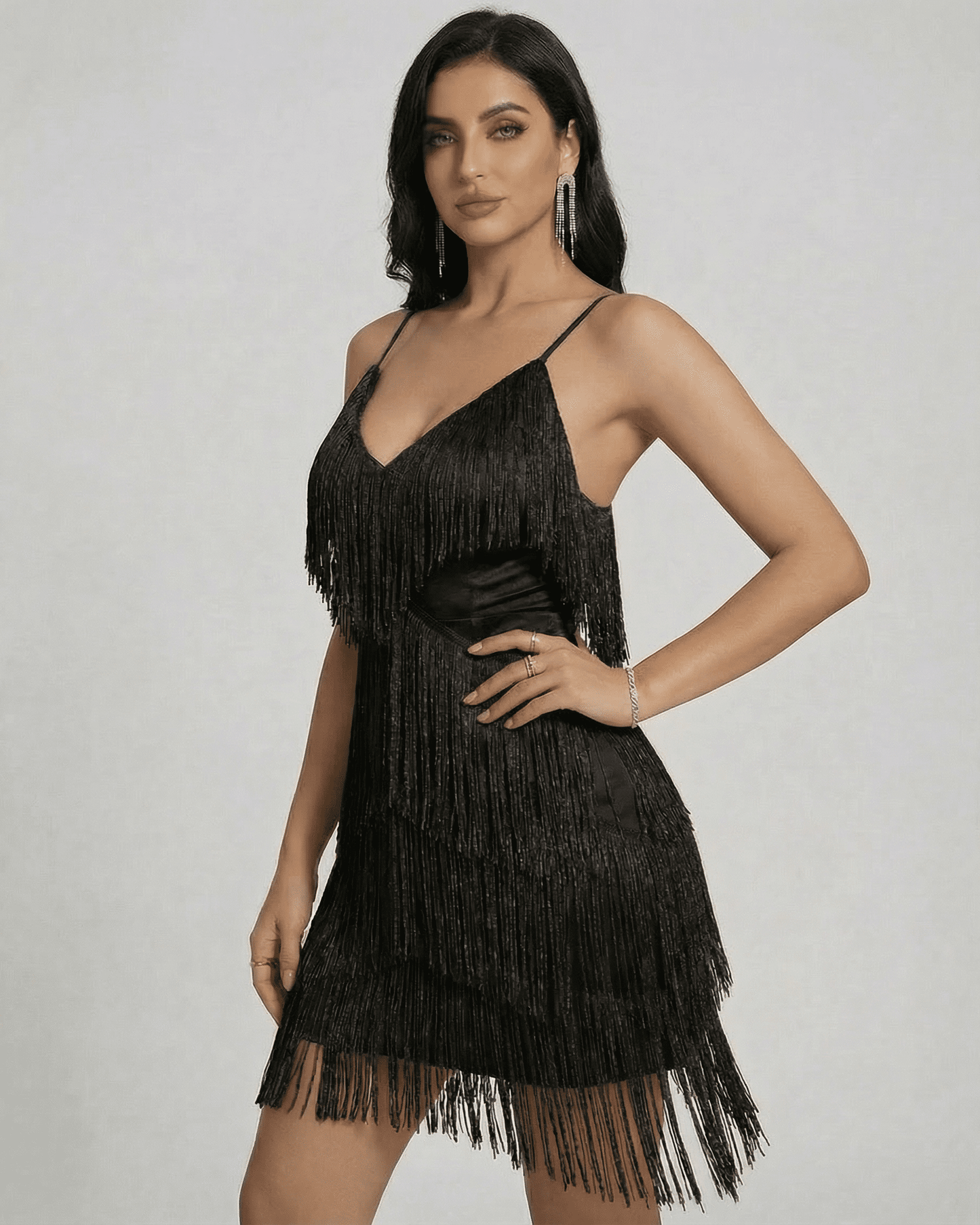 Noir Mini Dress by Lauven, featuring layered fringe and a sleek V-neck for a modern aesthetic.