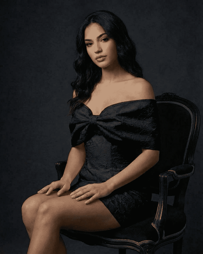 Noir Mini Dress by Lauven featuring an off-the-shoulder bowknot detail and a flattering A-line silhouette.