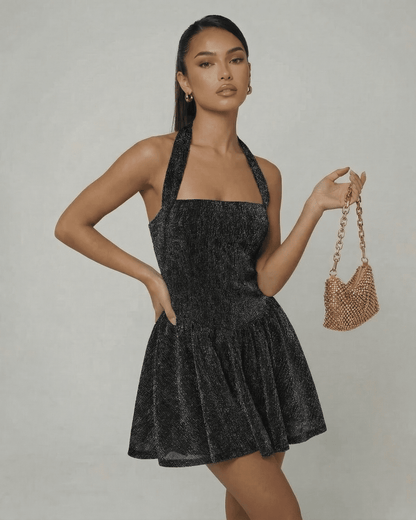 Noir Mini Dress by Lauven, sequin A-line mini dress with high waist silhouette and sleeveless design.