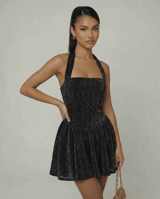 Noir Mini Dress by Lauven — Black sequin A-line mini dress with high waist and sleeveless design.