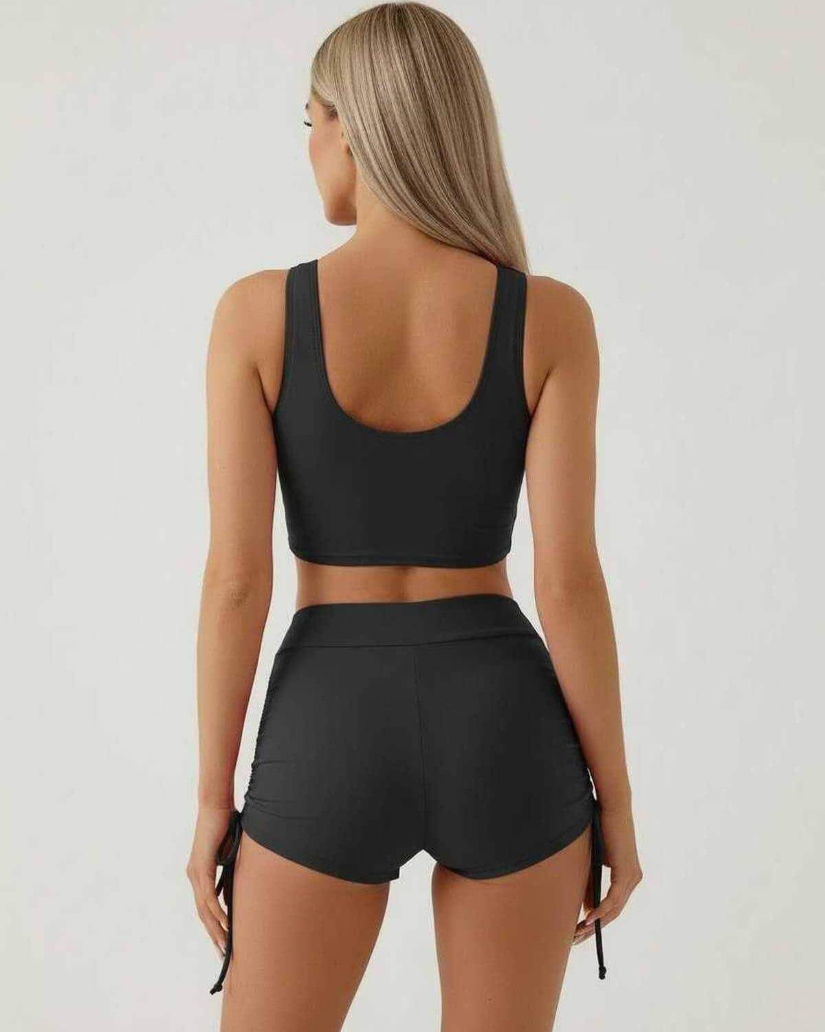 Noir Set by Lauven – Black sleeveless crop top and high waist shorts from behind