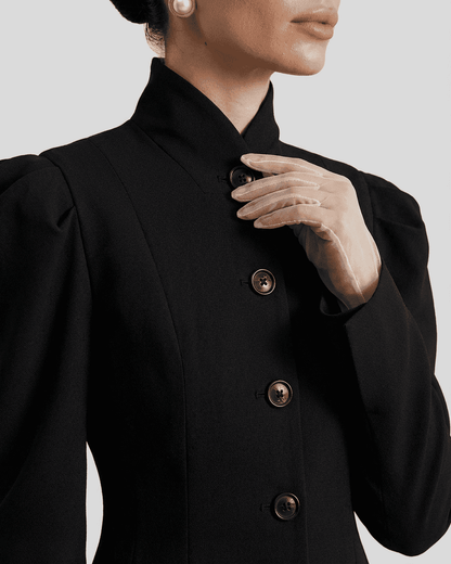 Elegant detail of the Noiré Blazer by Lauven, featuring a stand collar and structured puff sleeves.