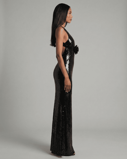 Noiré Maxi Dress from Lauven featuring a backless V-neck silhouette and striking floral sequin detail.