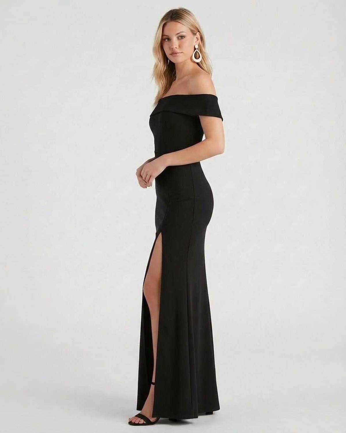 Noiré Maxi Dress by Lauven - Off shoulder black crepe maxi dress with a side slit, showcasing an elegant silhouette.