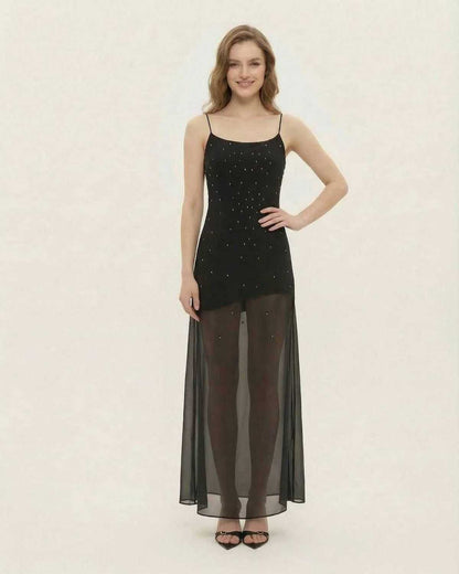 Noire Maxi Dress by Lauven featuring sheer mesh A-line silhouette with fine glitter detail.