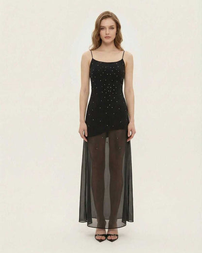 Noire Maxi Dress by Lauven featuring sheer mesh A-line silhouette with fine glitter detail.