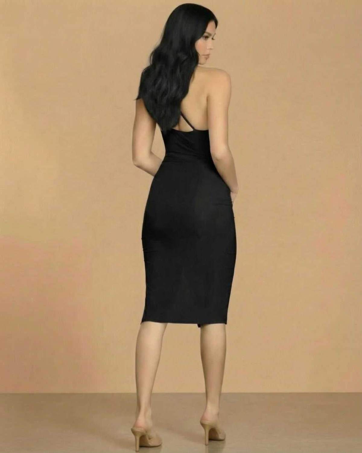 Noiré Midi Dress by Lauven, showcasing a timeless bodycon silhouette with cowl neckline from the back.