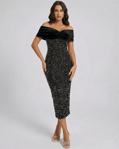 Noiré Midi Dress by Lauven – Black off shoulder velvet sequin dress showcasing elegant silhouette and timeless glamour.