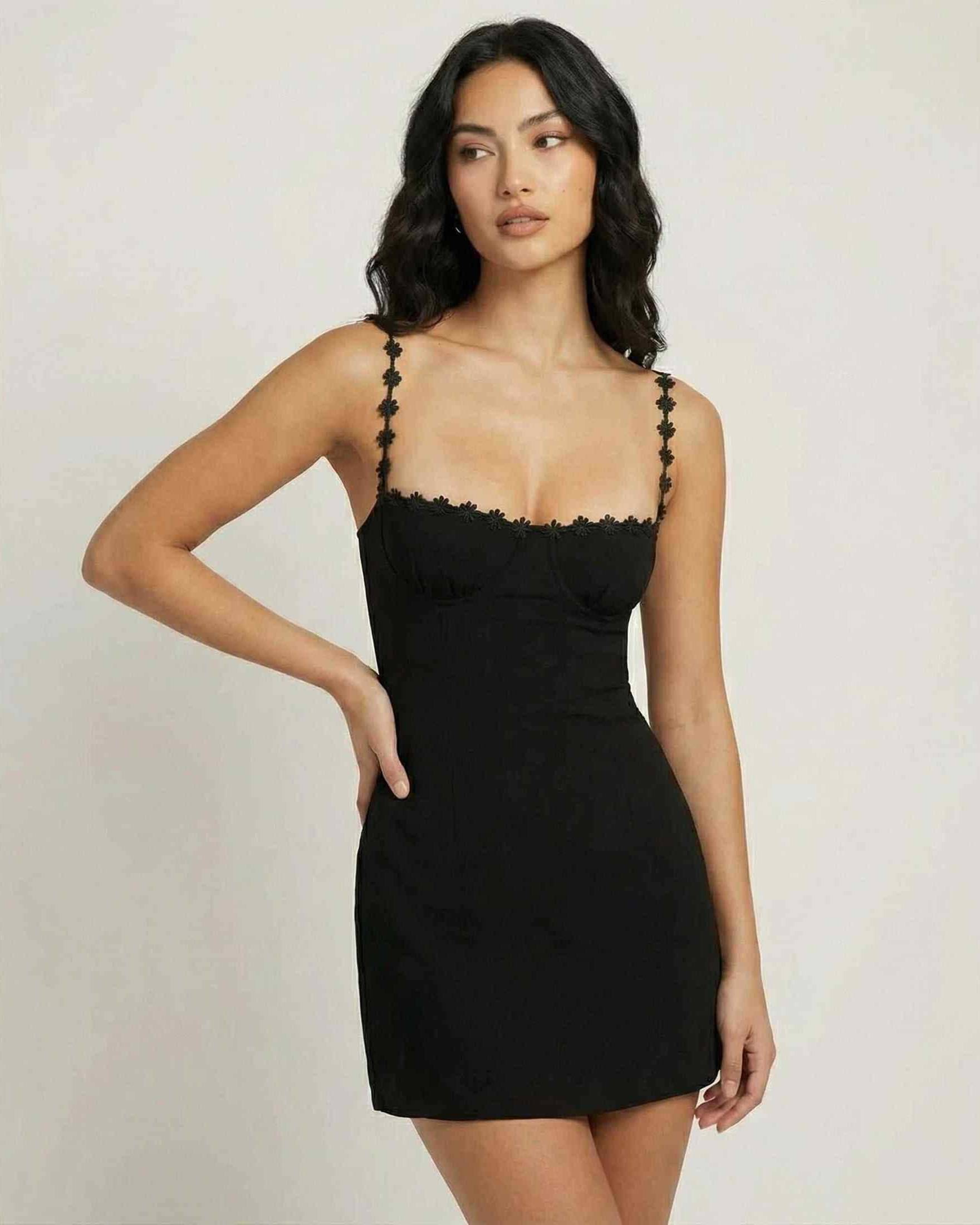 Noiré Mini Dress by Lauven, featuring a black square neck and spaghetti straps with floral trim.