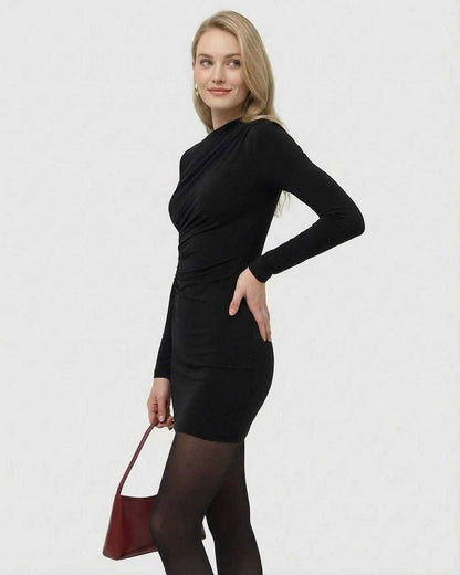 Model wearing the Lauven Noiré Mini Dress, a black long sleeve bodycon mini dress with high waist design.