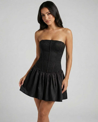 Noiré Mini Dress by Lauven, a strapless corset mini dress with a flared skirt in classic black.